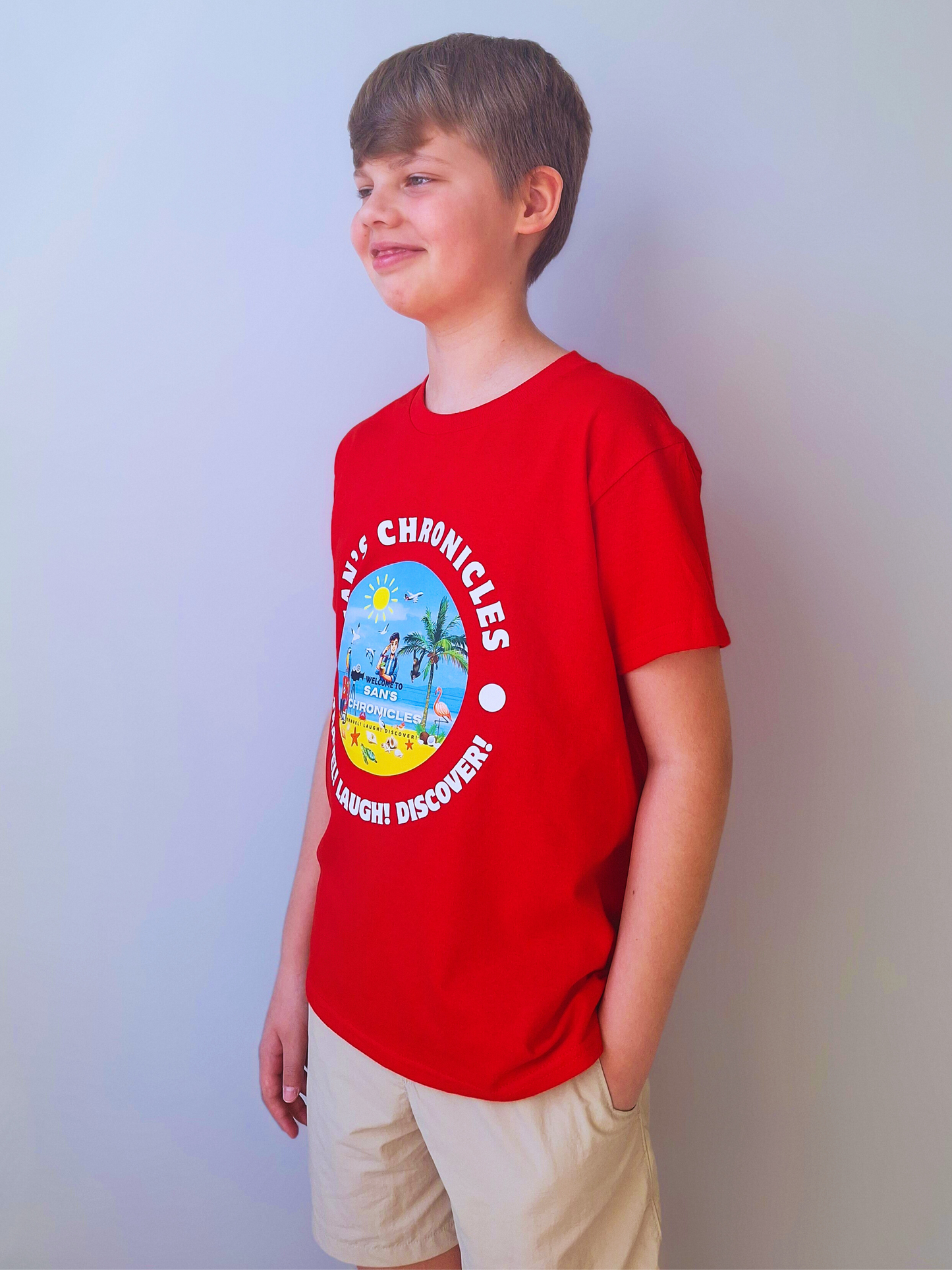 San’s Chronicles™ Official T-Shirt – Wear the Adventure! 🎉👕 Red