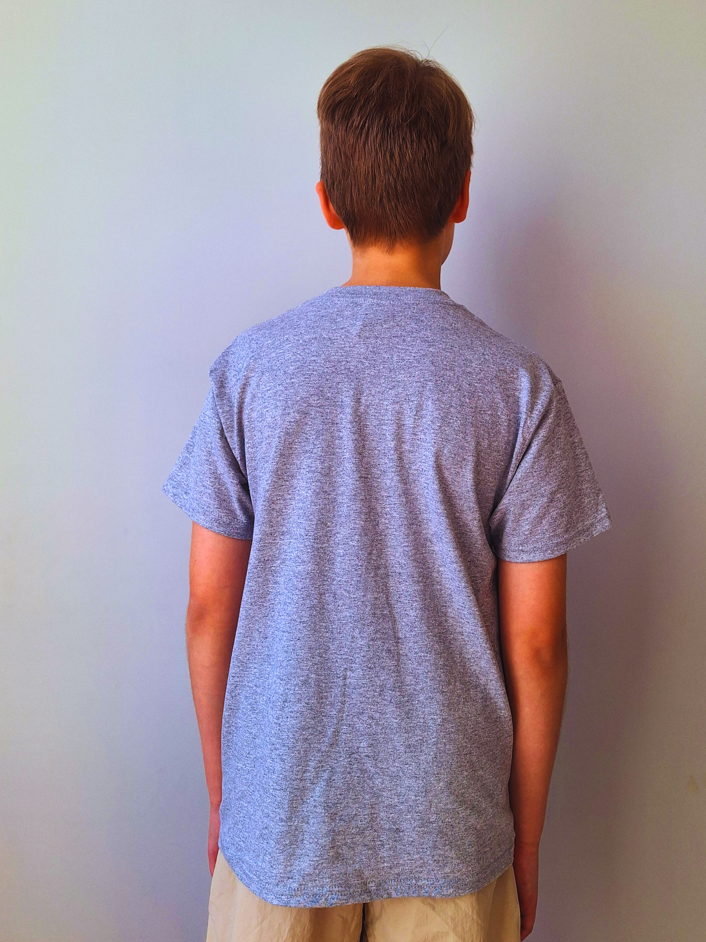 San’s Chronicles™ Official T-Shirt – Wear the Adventure! 🎉👕 Grey